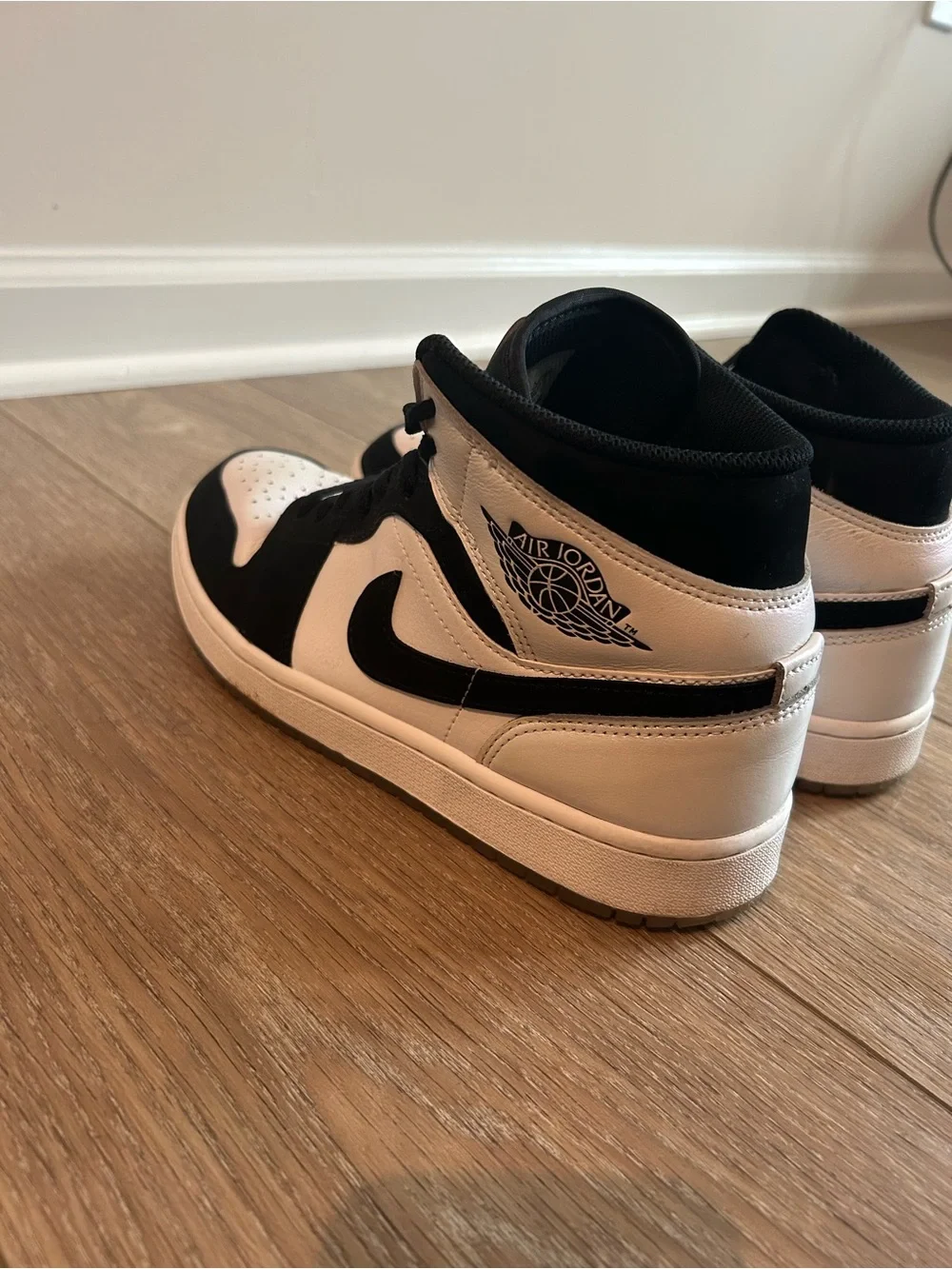 Nike Black and White Mid-Top Sneakers